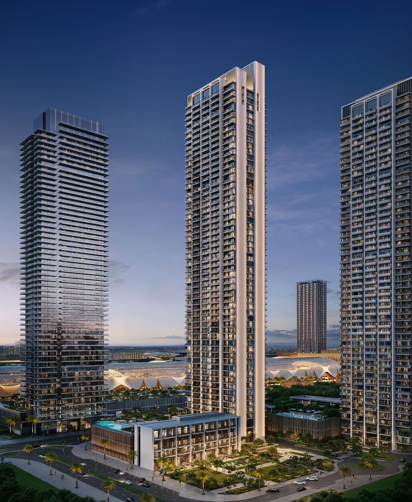 Full height view of the Valia towers at dusk