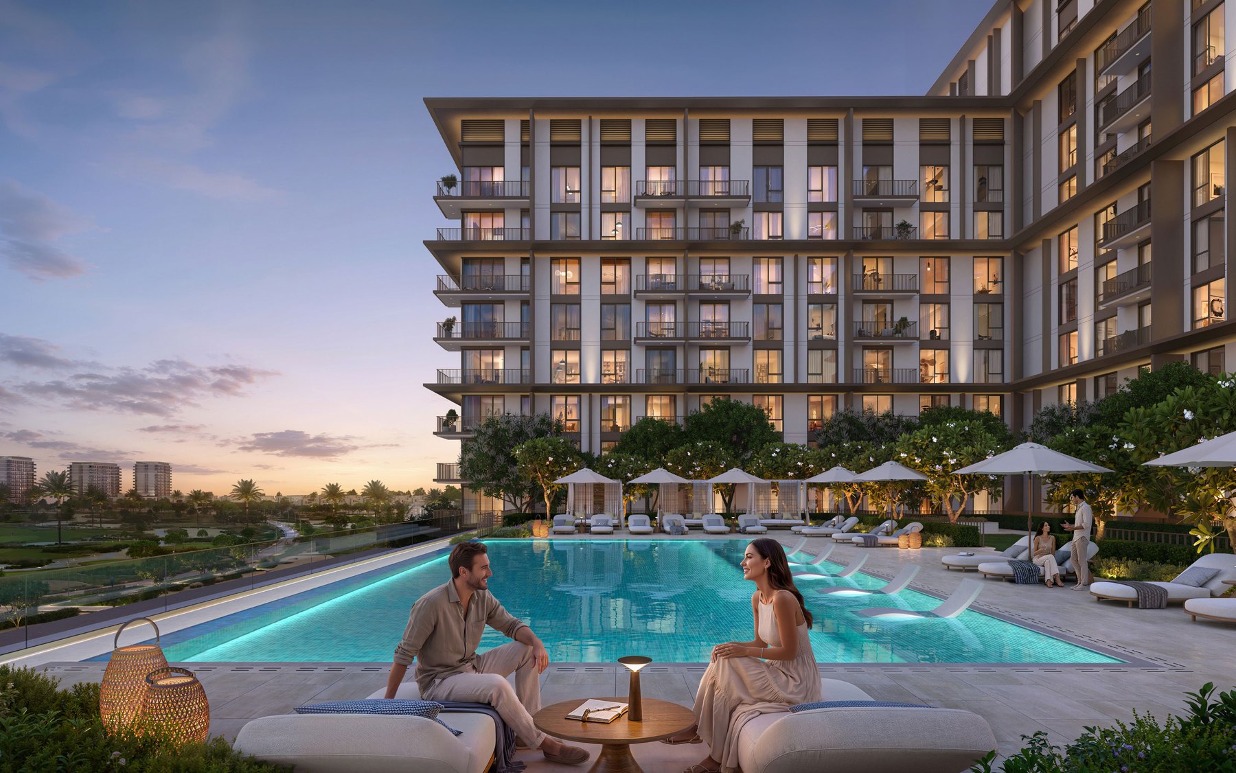 Infinity swimming pool overlooking the Golf Trails residences at sunset